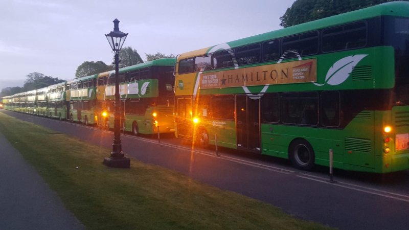 Image of Green and Yellow Dublin Buses parked up in the Phoenix Park 