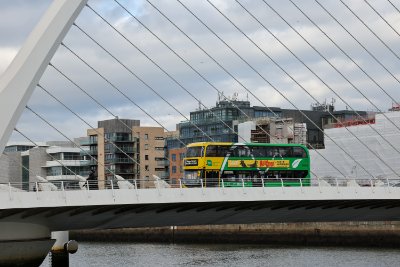 Dublin Bus driving across bridge.