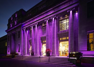 Outside National Concert Hall with purple lighting on building
