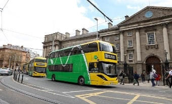 Two buses outside trinity