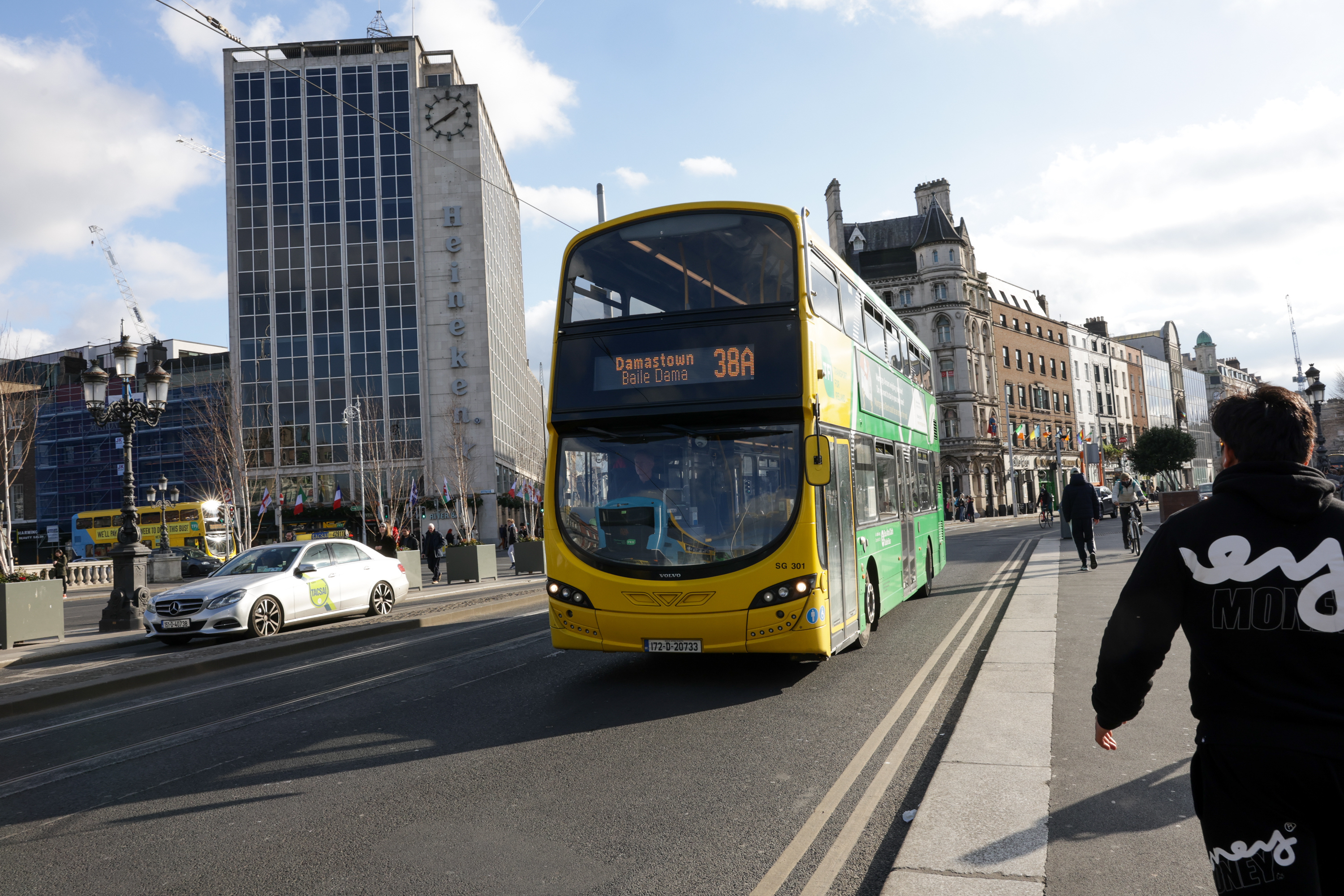 On coming bus in action crossing O'Connell Bridge Dublin