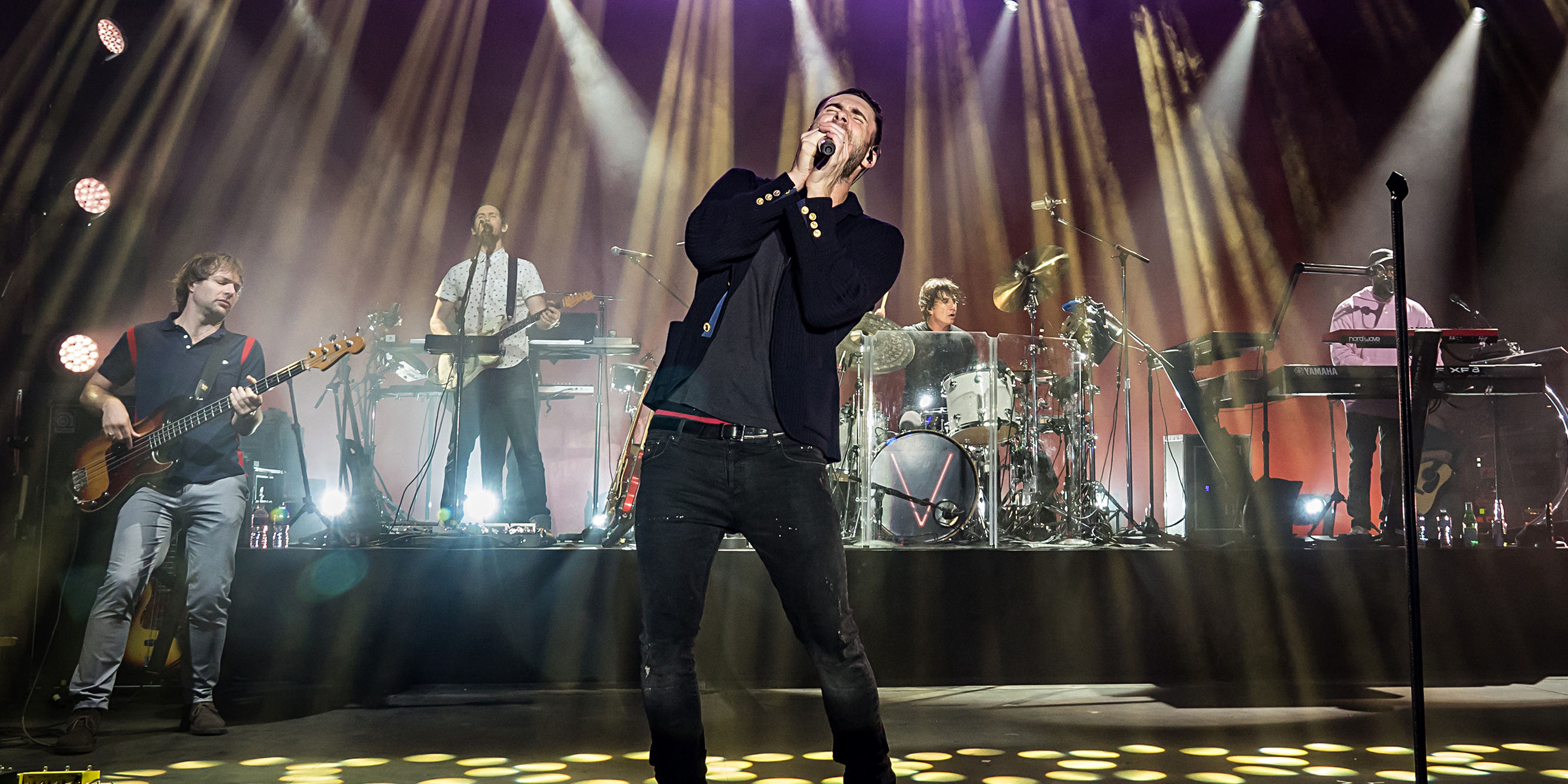 Image of Maroon 5 on stage