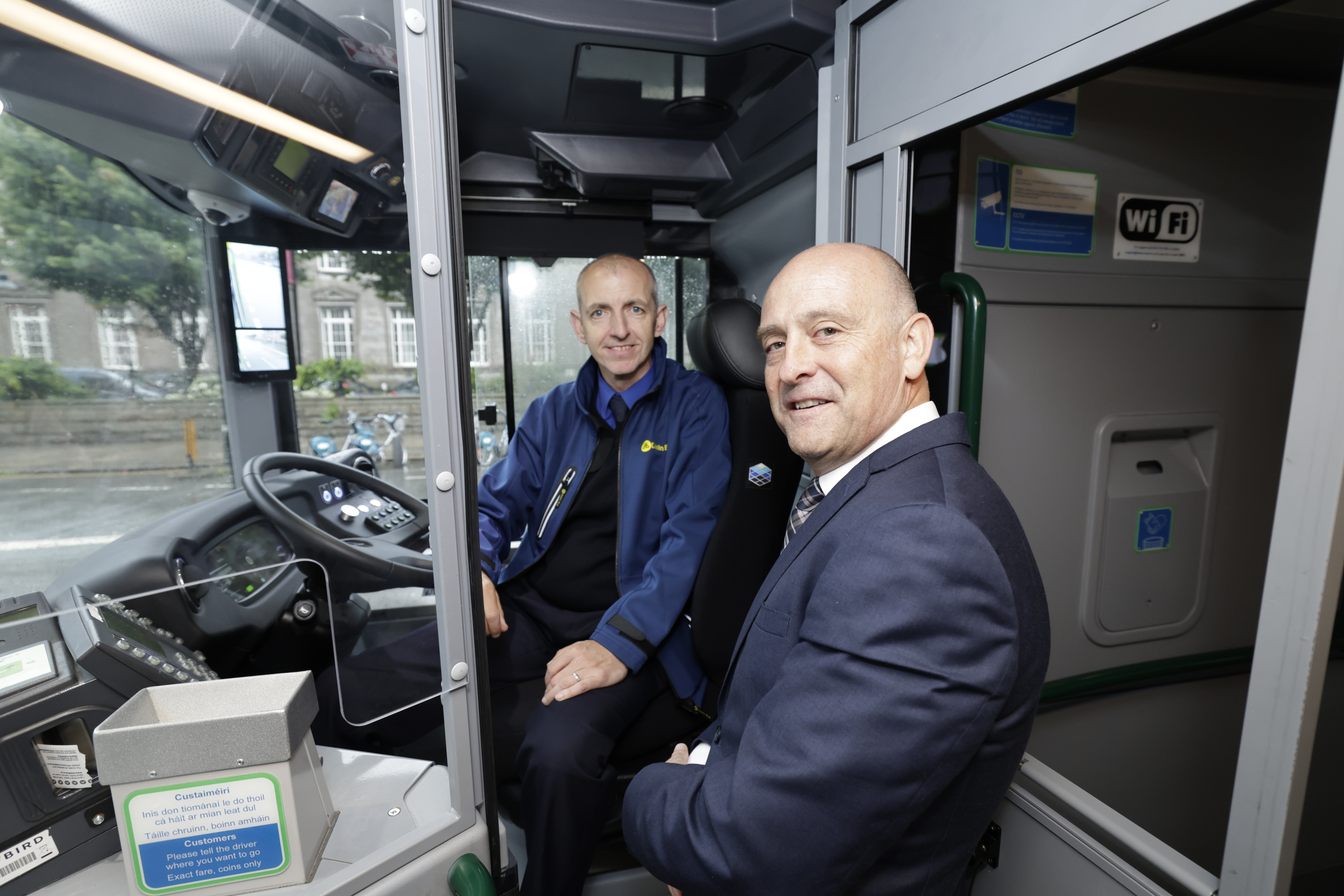 Image of Dublin Bus CEO and bus driver on bus