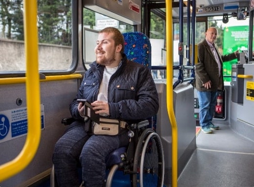 Man in wheelchair on bus 