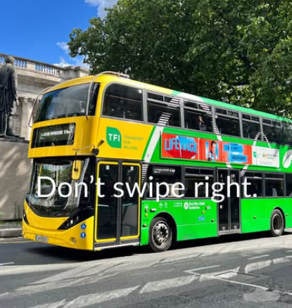 Image of bus on a bright day on Dame Street Dublin with image text 'Don't Swipe Right'. 